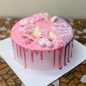 Vanilla Birthday Cake with Elegant Floral Design